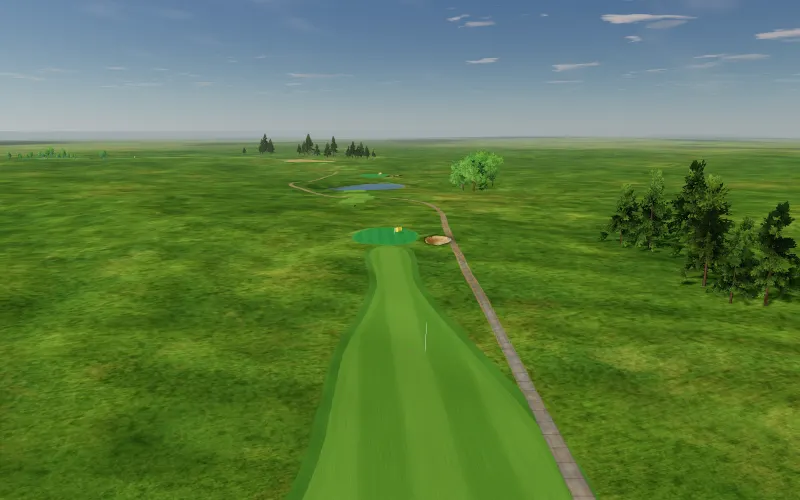 Flyover down a fairway toward a green, with a cart path and tree lines.